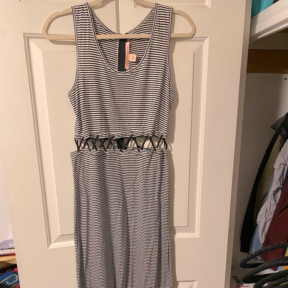 Rebellious one striped, cut out maxi dress. Perfect for summer!